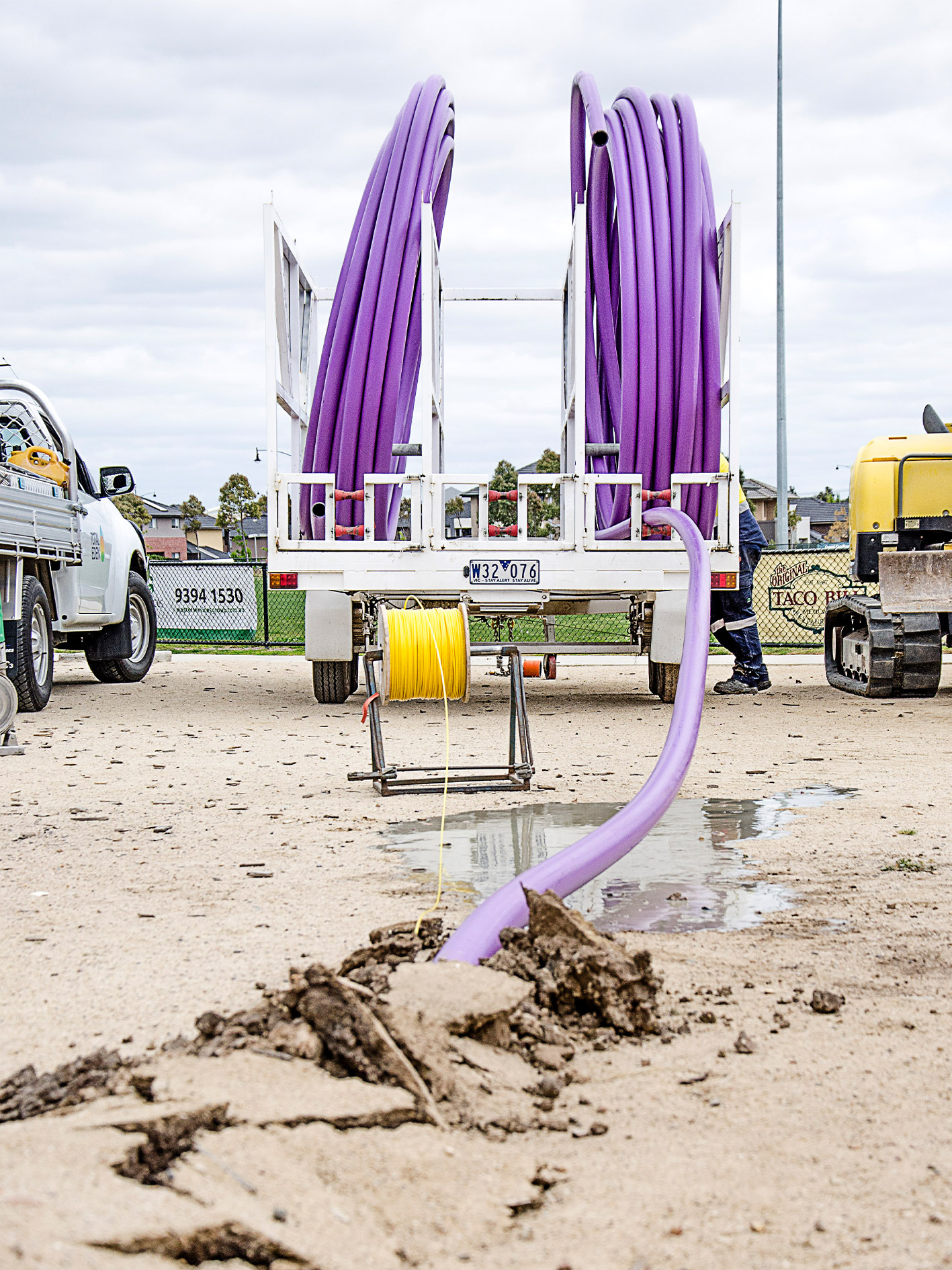 a truck with purple tubes on it