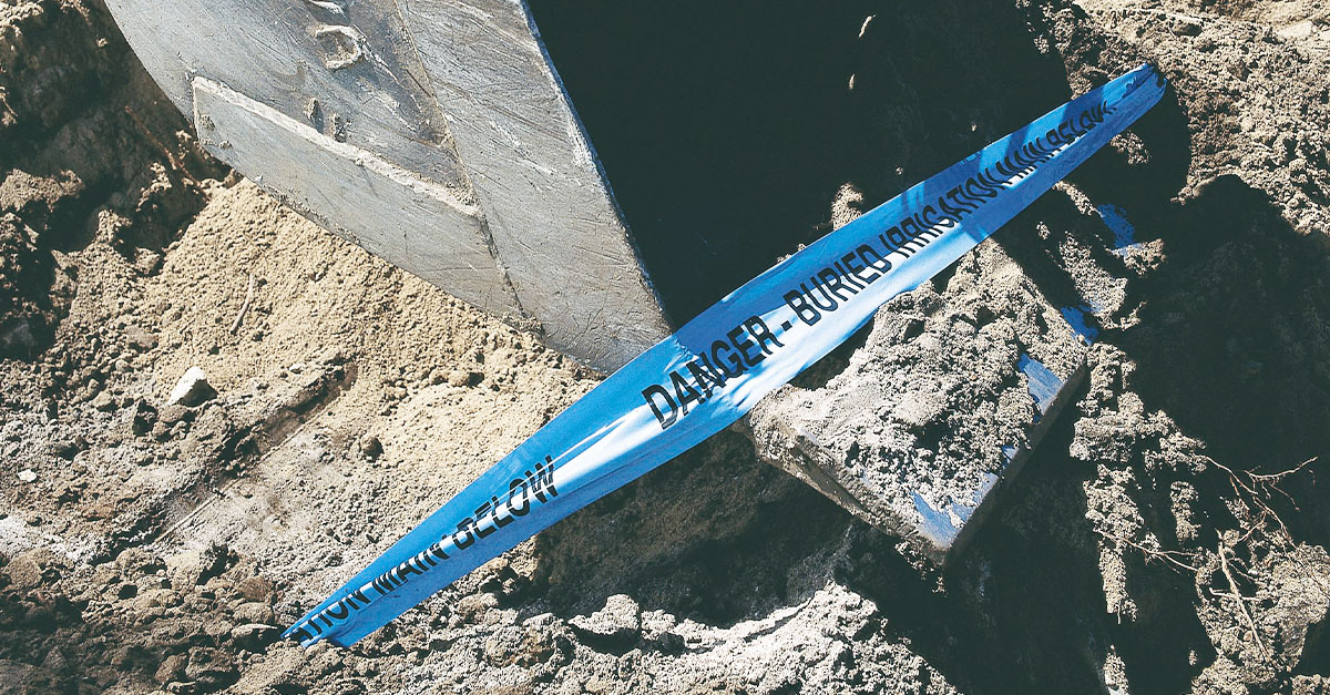 a blue underground warning tape